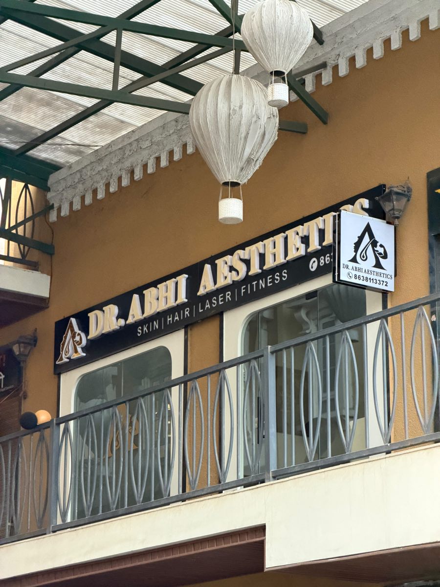 The Dr. Abhi Aesthetics entrance on the first floor balcony at Streets of Europe, Hinjawadi.